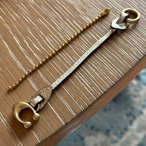 Coach Large C hangtag on Metalic leather